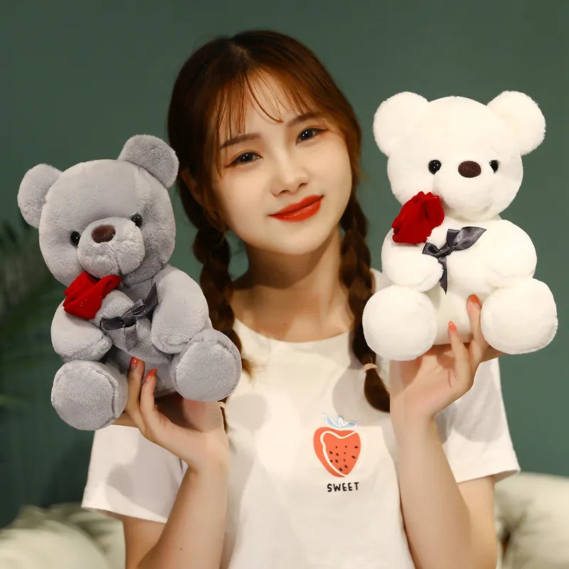 Liebesumarmung Teddy Bär mit Rose