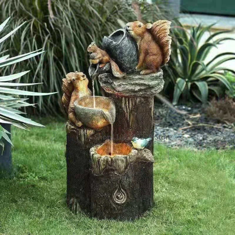 Solar-Dekorationsbrunnen mit Ente und Eichhörnchen | Gartenfigur mit LED-Licht | Wetterfestes Resin | Ideal für Terrasse und Balkon