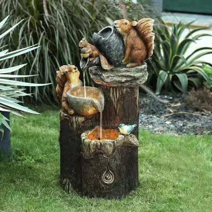 Solar-Dekorationsbrunnen mit Ente und Eichhörnchen | Gartenfigur mit LED-Licht | Wetterfestes Resin | Ideal für Terrasse und Balkon